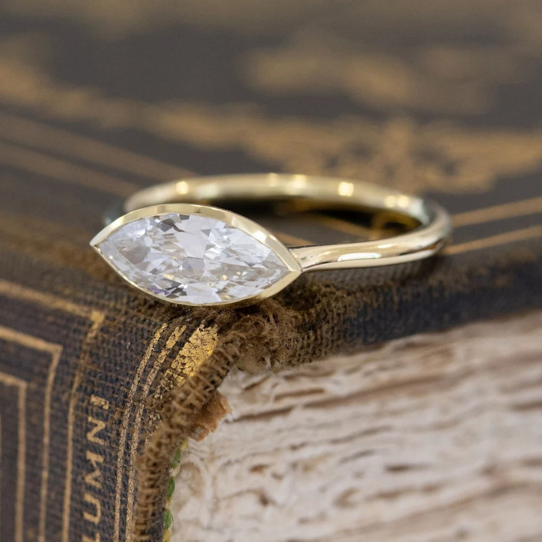 Top-down view of diamond cut east west engagement ring