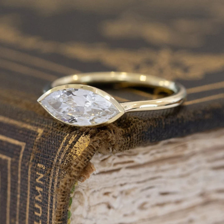 Top-down view of diamond cut east west engagement ring