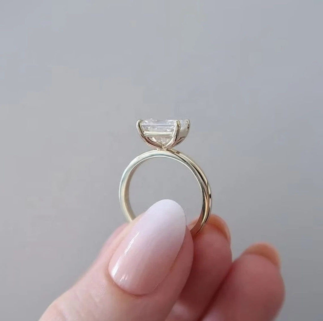 Radiant cut diamond ring worn on hand