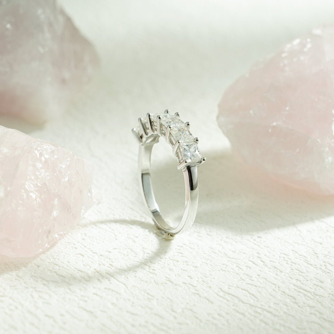 Side view of princess diamond wedding band
