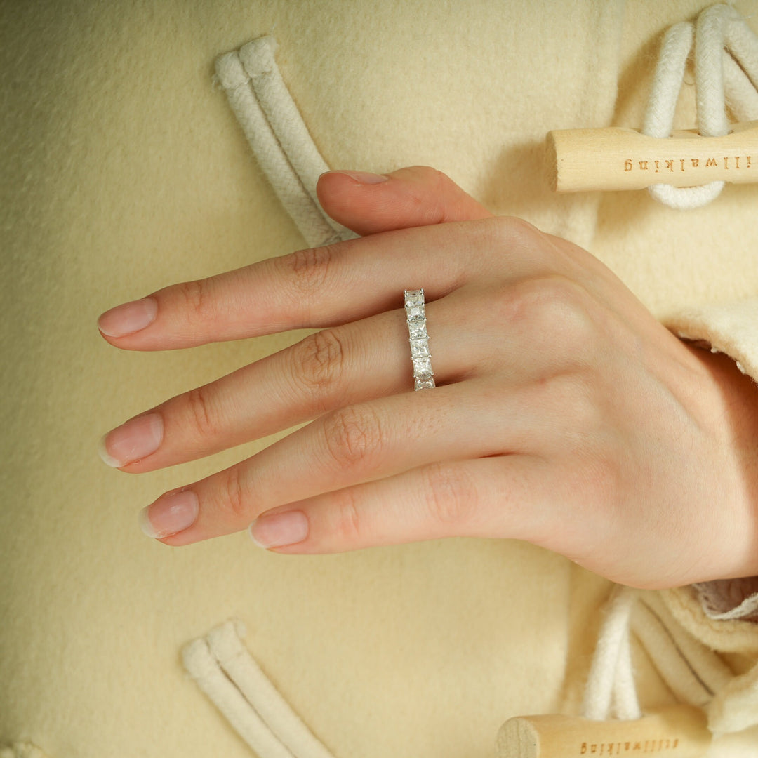 Princess diamond band stacked with engagement ring