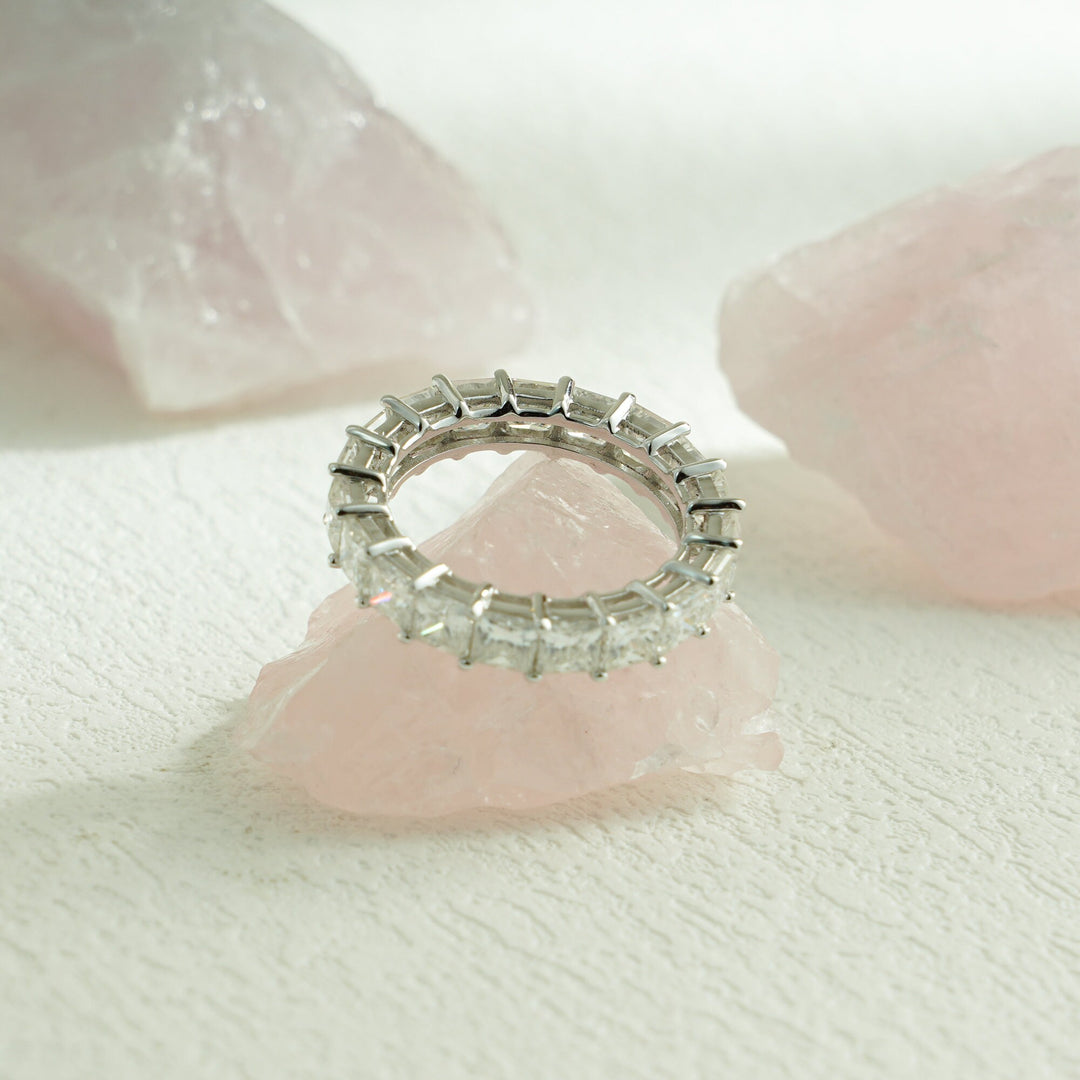 Side view of princess diamond wedding band