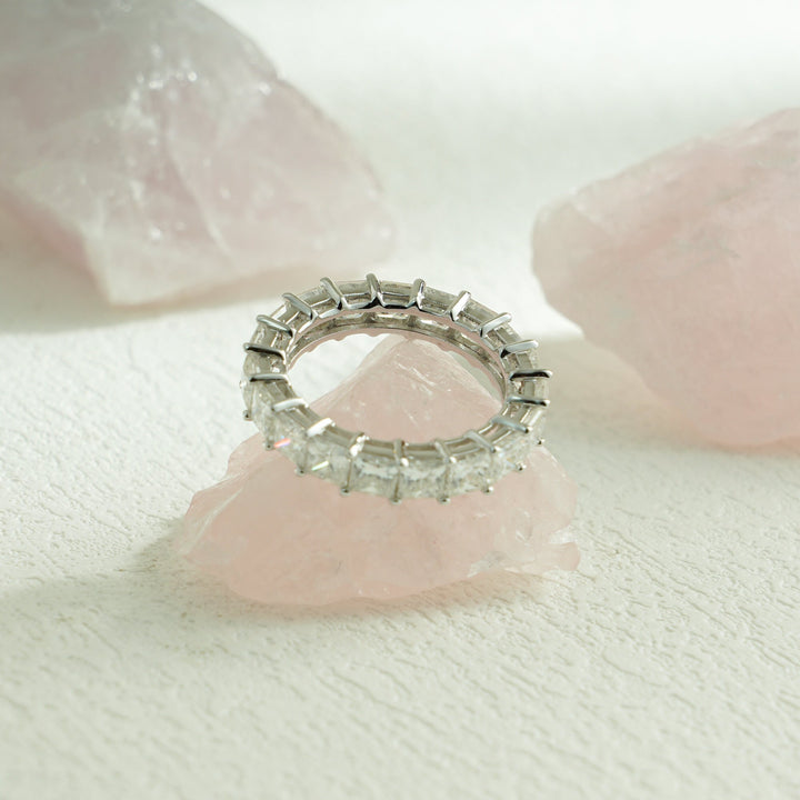 Side view of princess diamond wedding band