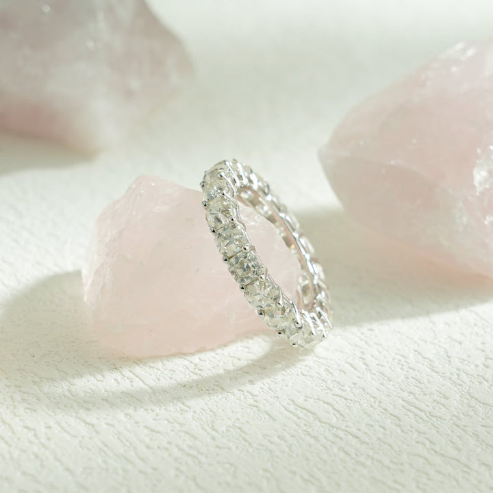 Side view of cushion diamond wedding band