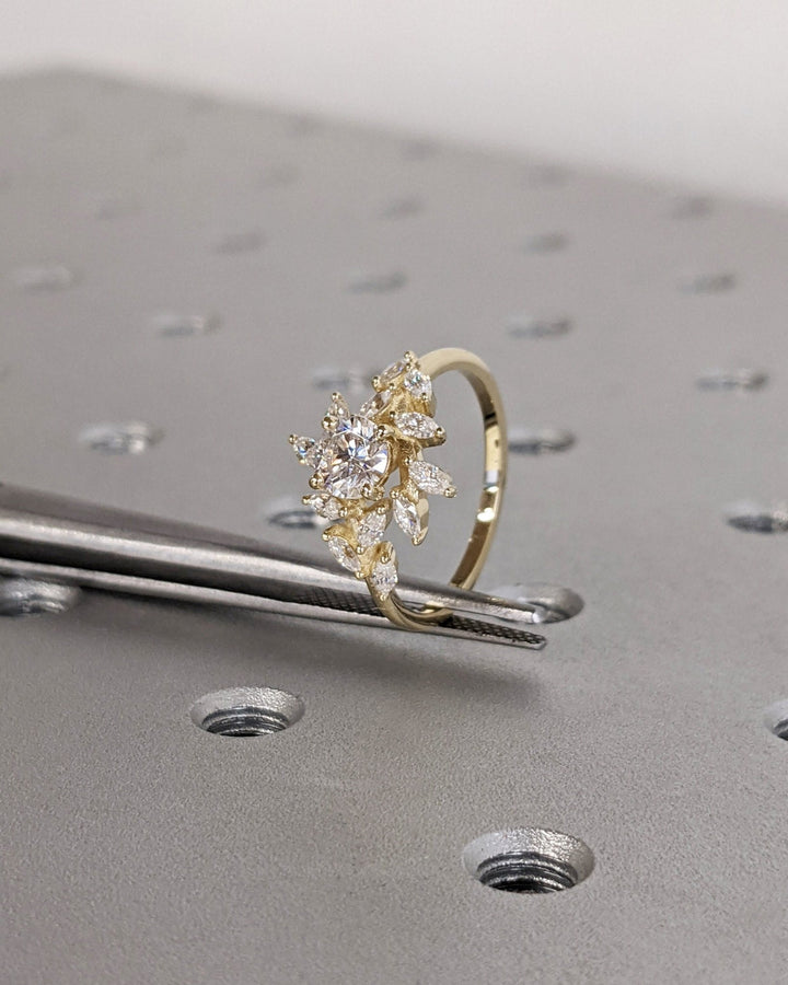 Round cut engagement ring shown with authenticity certificate