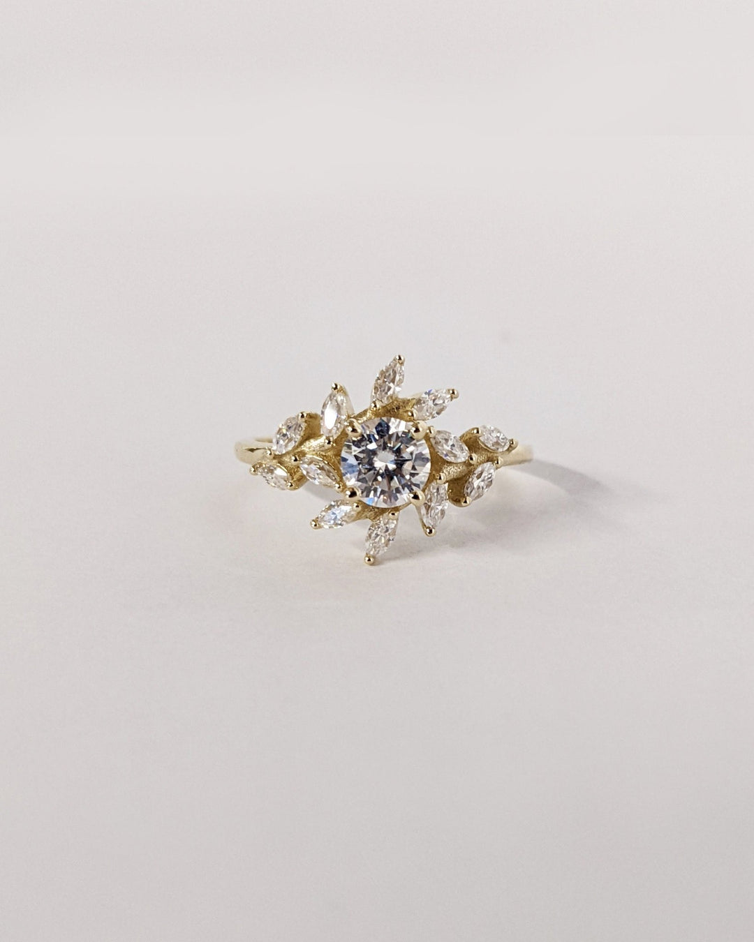 Classic round cluster engagement ring crafted for everyday wear