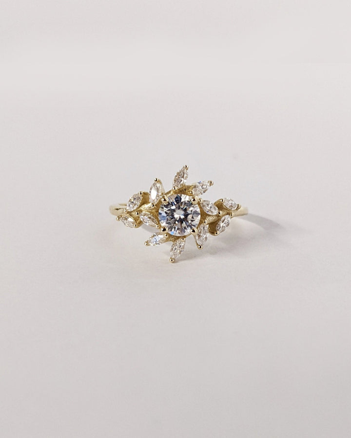 Classic round cluster engagement ring crafted for everyday wear