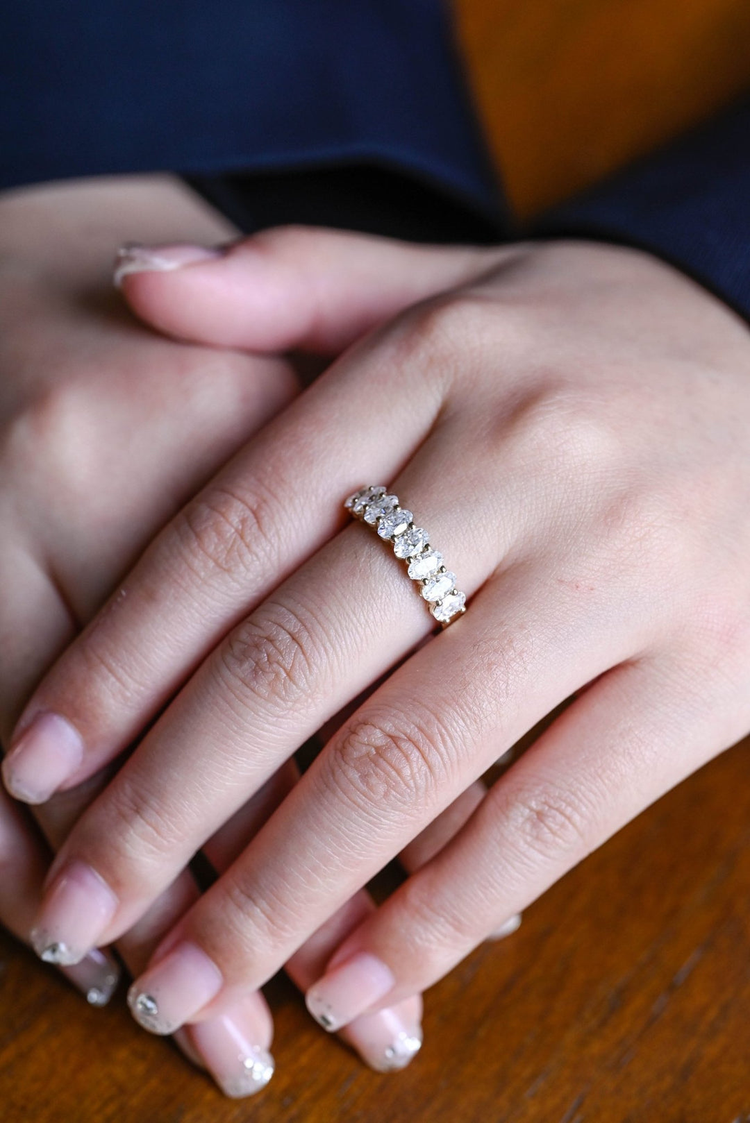 Oval diamond wedding band in rose gold