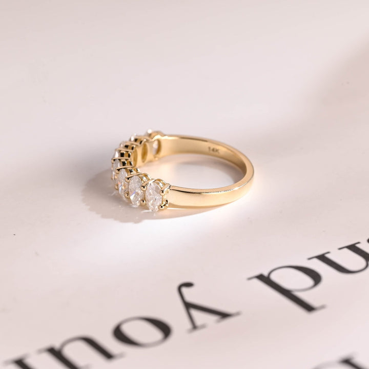Oval diamond wedding band in yellow gold