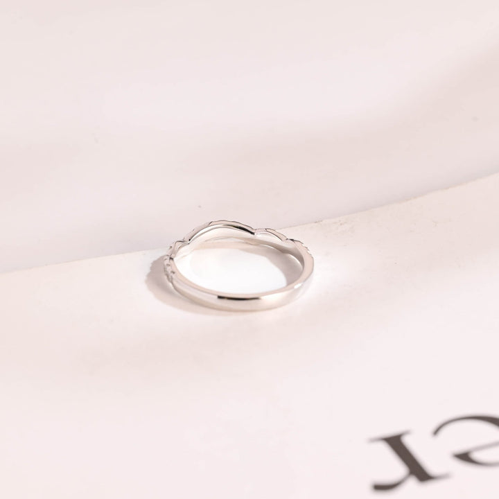Round diamond band stacked with engagement ring