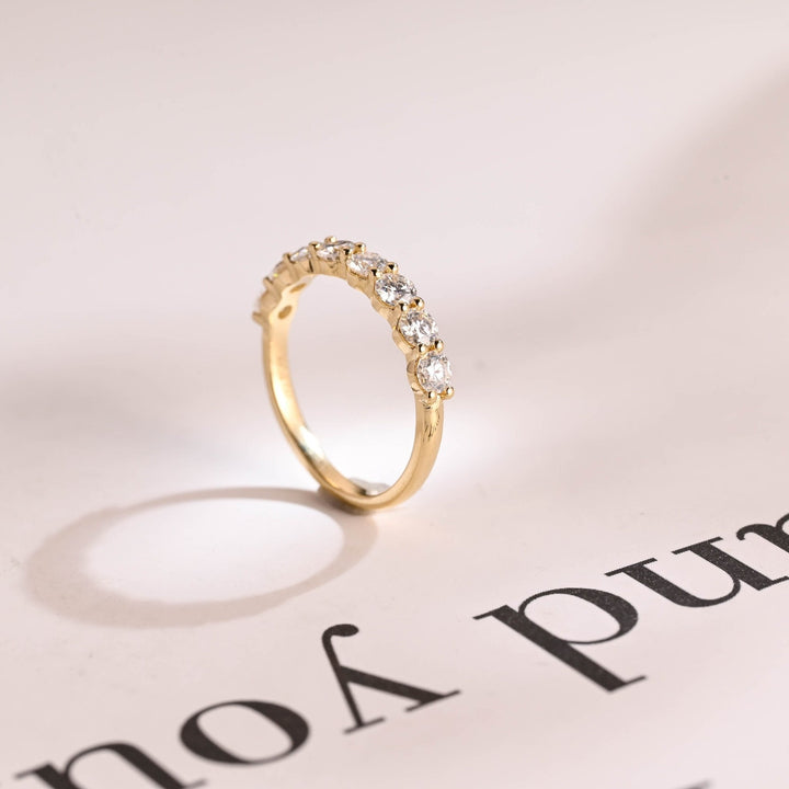 Side view of round diamond wedding band