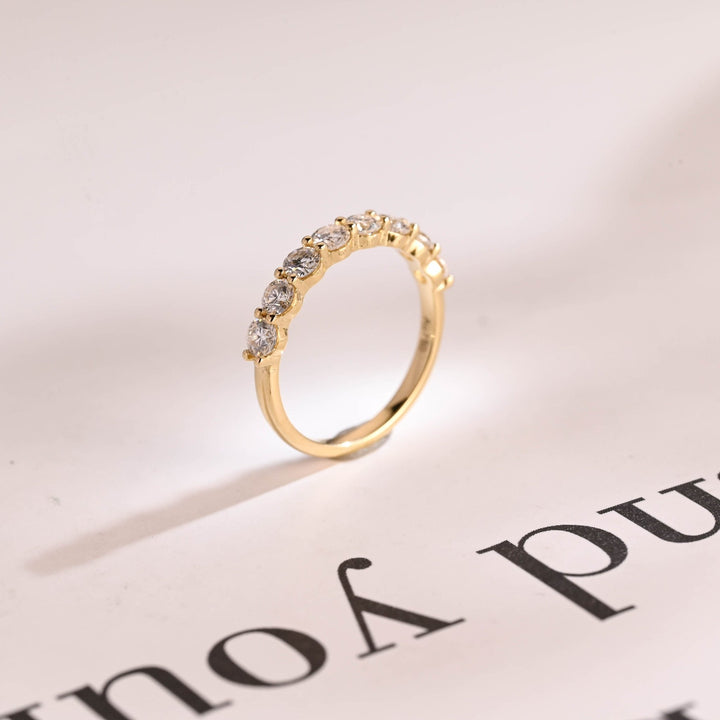 Round lab grown diamond band worn on hand