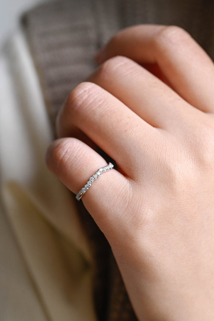 Round diamond wedding band in rose gold