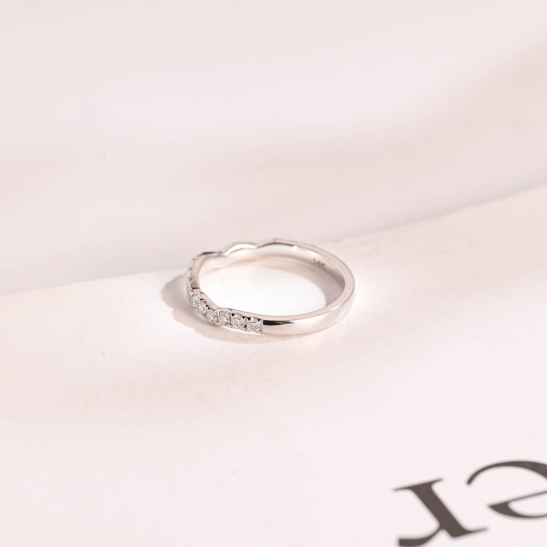 Side view of round diamond wedding band