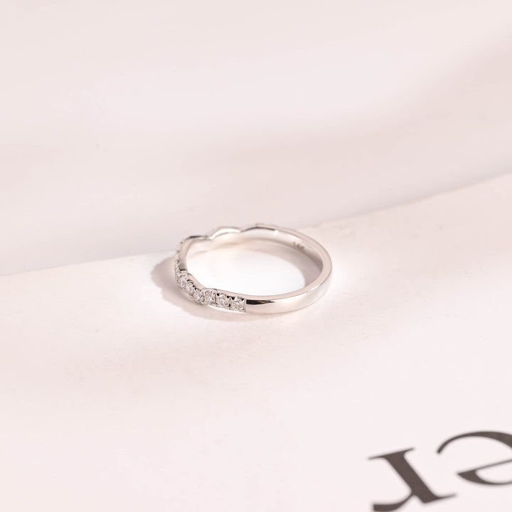 Side view of round diamond wedding band
