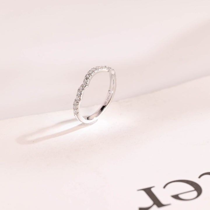 Round lab grown diamond band worn on hand