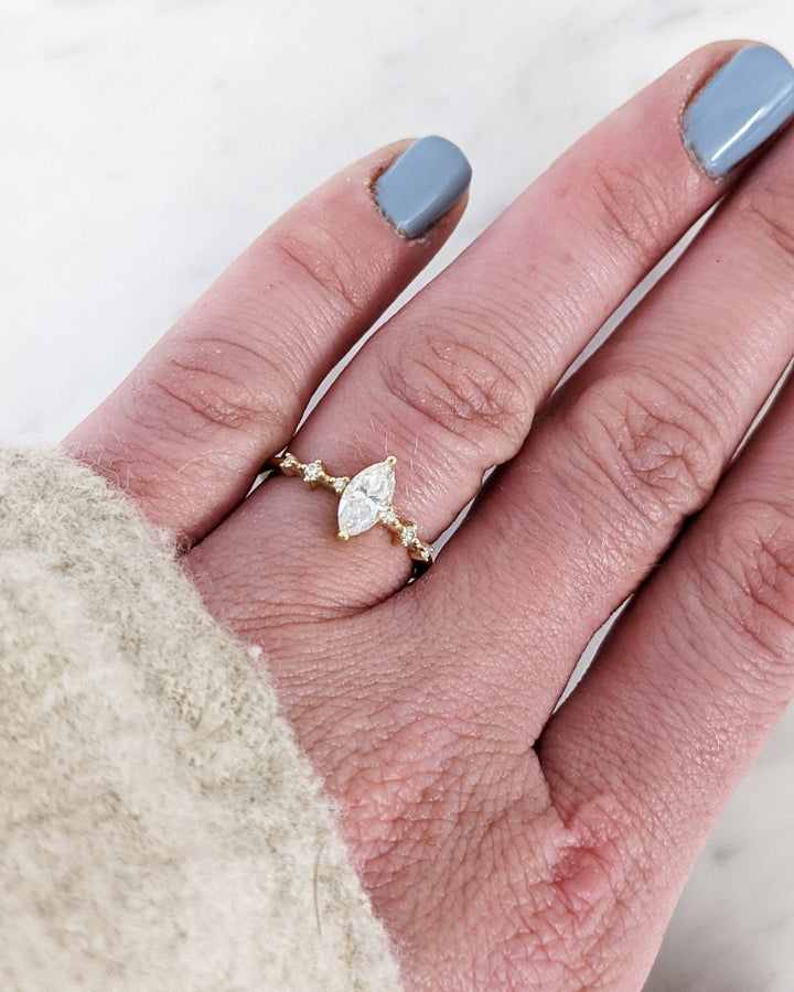Top-down view of marquise cut pave engagement ring