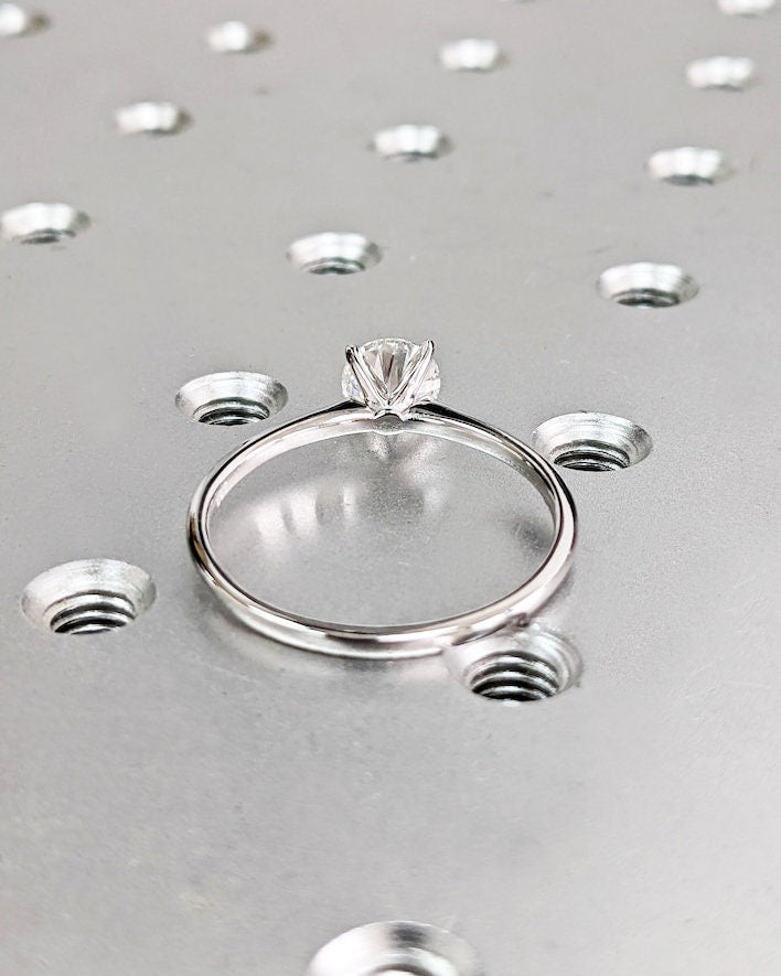 Premium round cut solitaire engagement ring crafted in solid gold