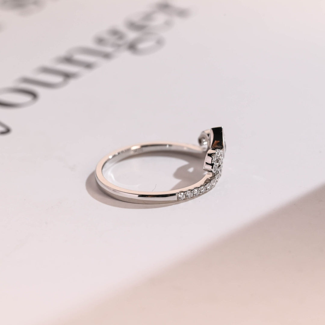 Round & Pear diamond band stacked with engagement ring