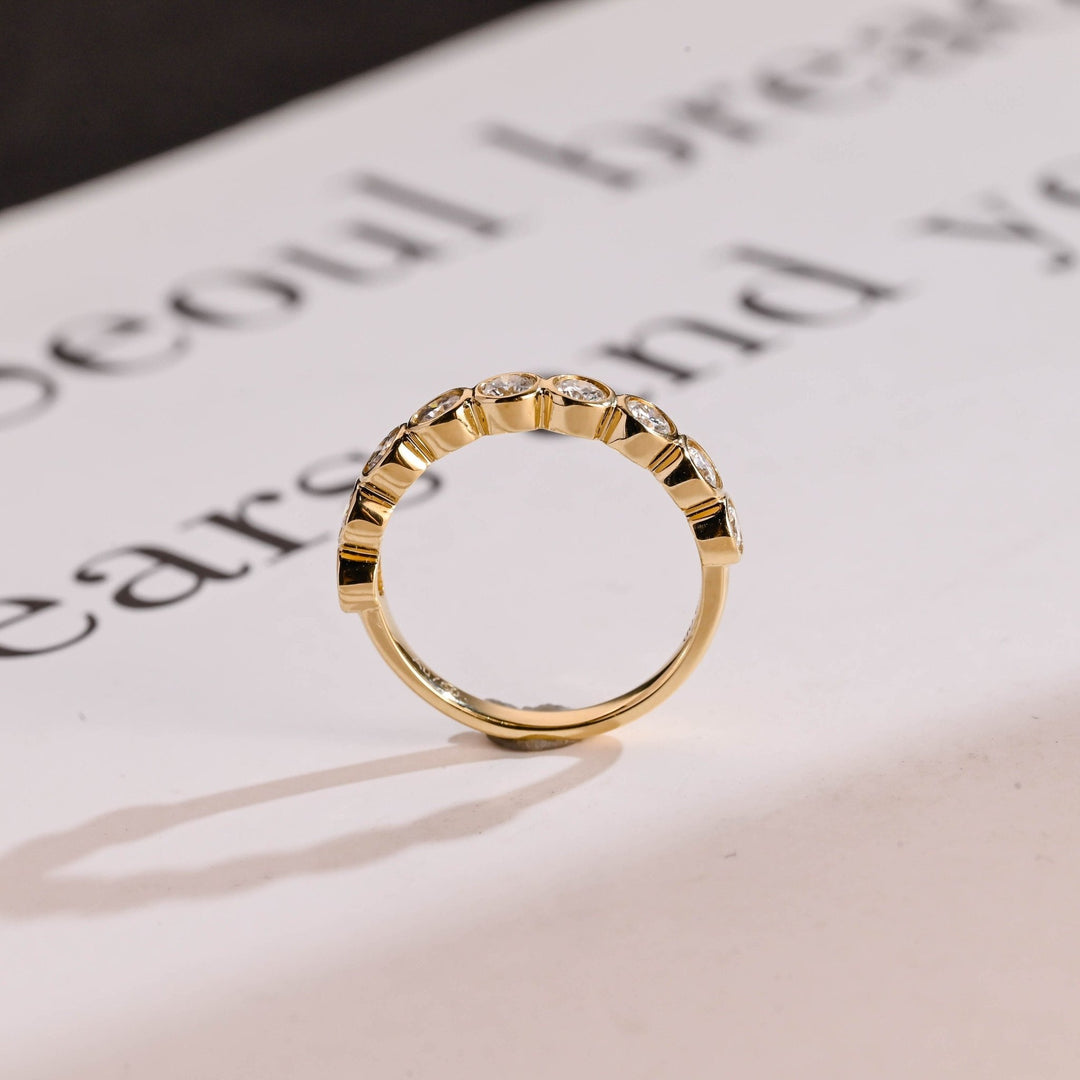 Round diamond wedding band in rose gold