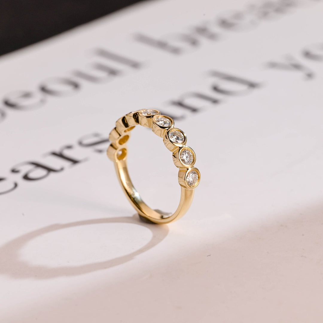 Side view of round diamond wedding band
