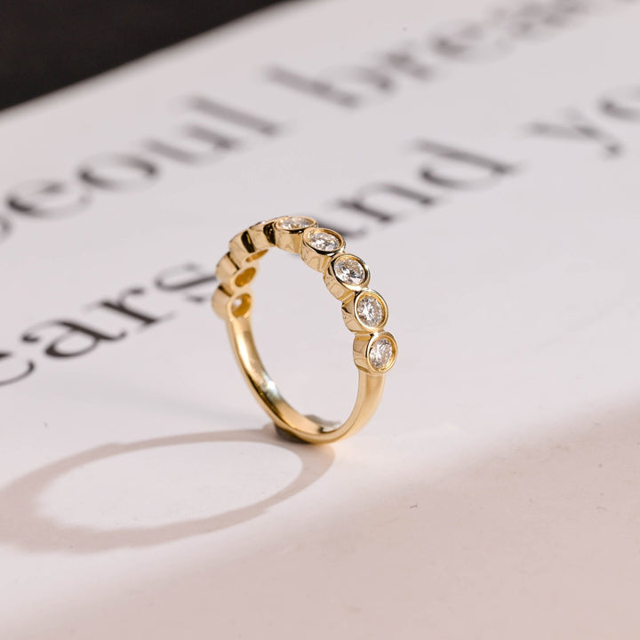 Side view of round diamond wedding band