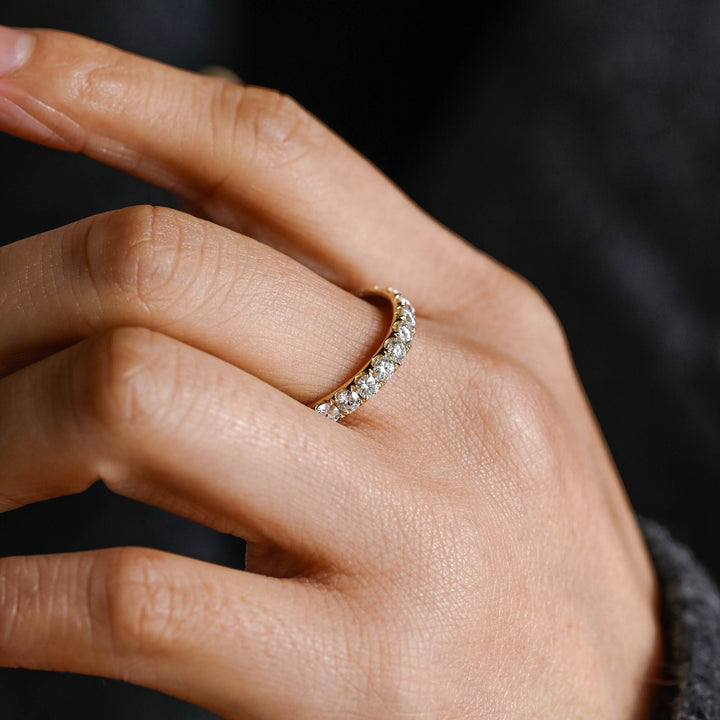 Round diamond band stacked with engagement ring