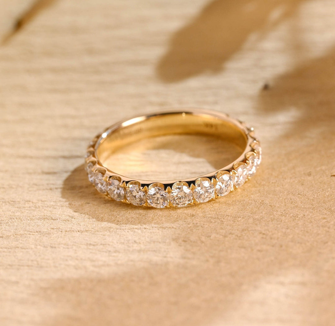Round diamond wedding band in rose gold