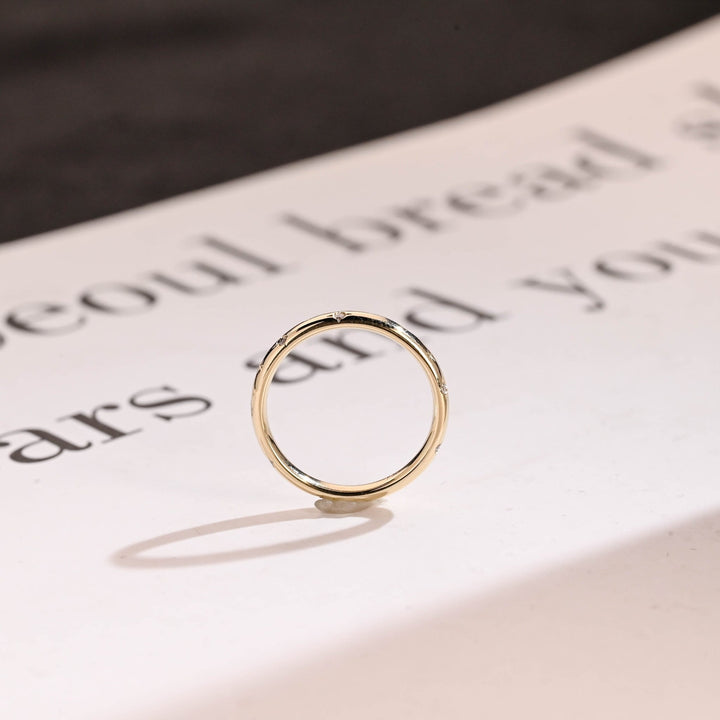 Ethically sourced round diamond eternity band