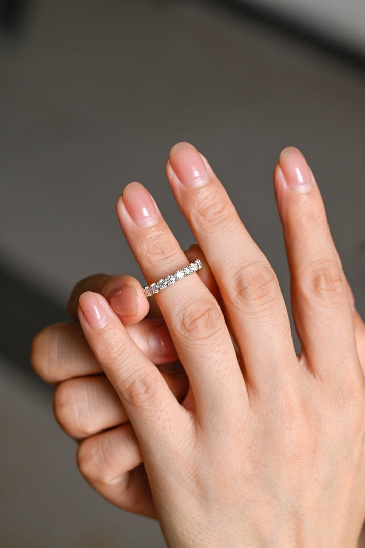 Round diamond band stacked with engagement ring