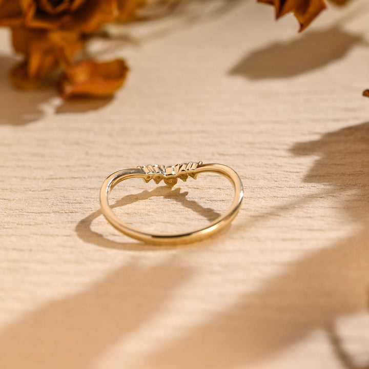 Side view of round diamond wedding band