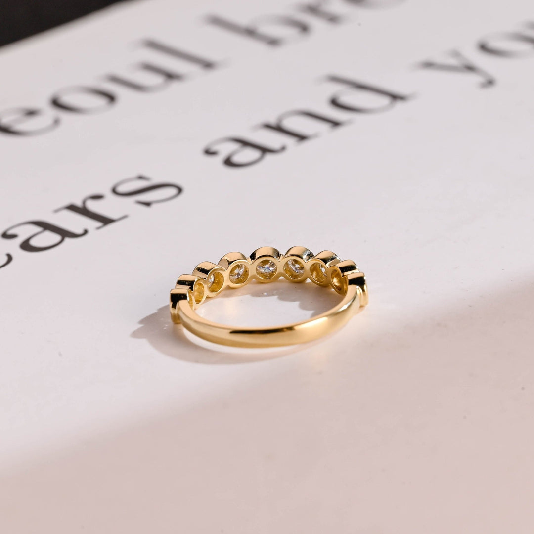 Round lab grown diamond band worn on hand