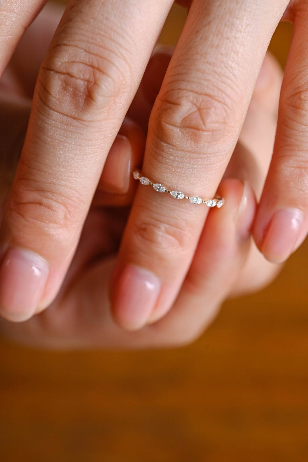 Marquise diamond band stacked with engagement ring