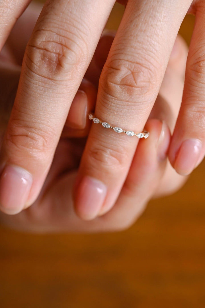 Marquise diamond band stacked with engagement ring