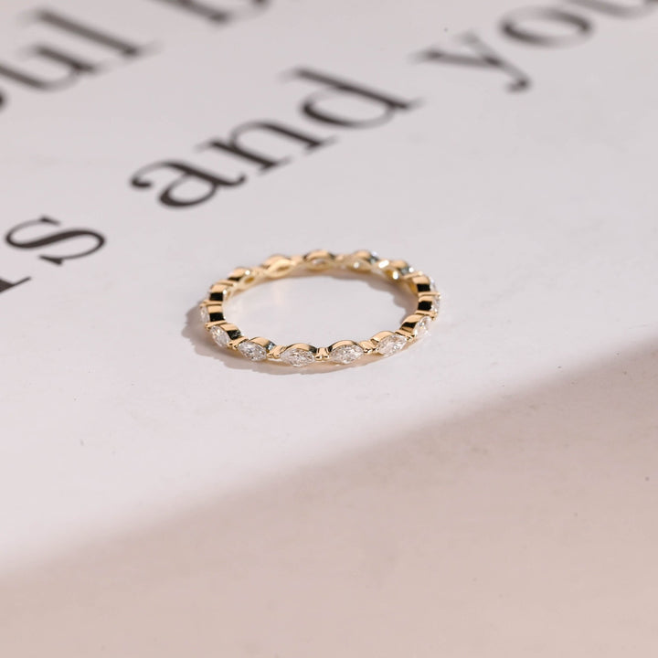 Marquise diamond wedding band in yellow gold