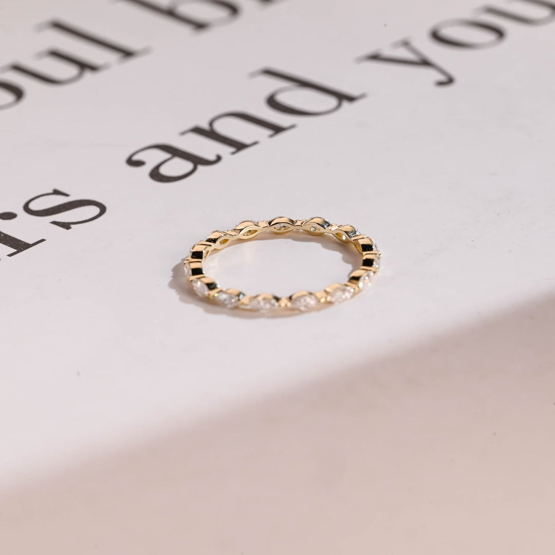 Marquise diamond wedding band in yellow gold