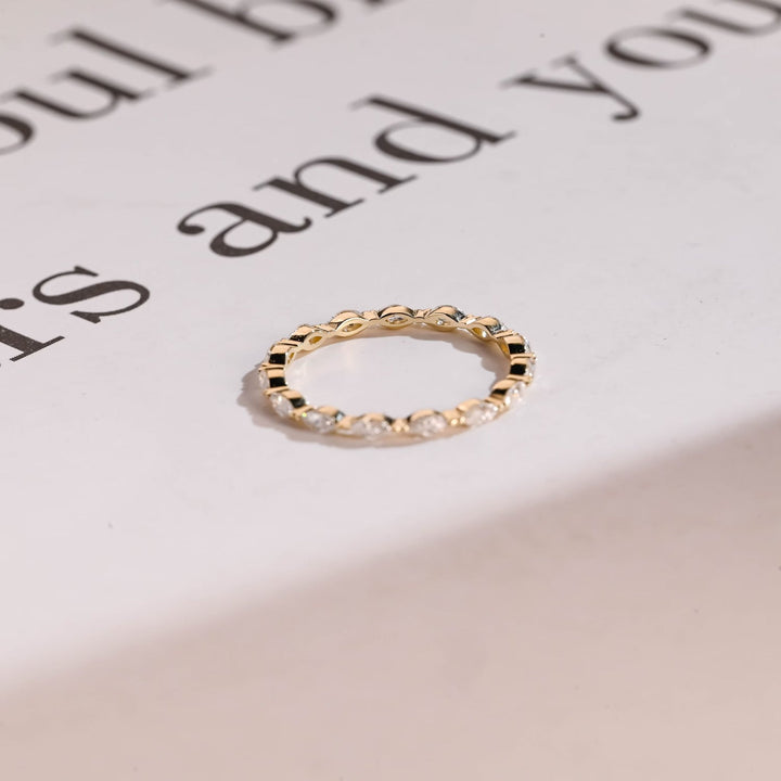 Marquise diamond wedding band in yellow gold