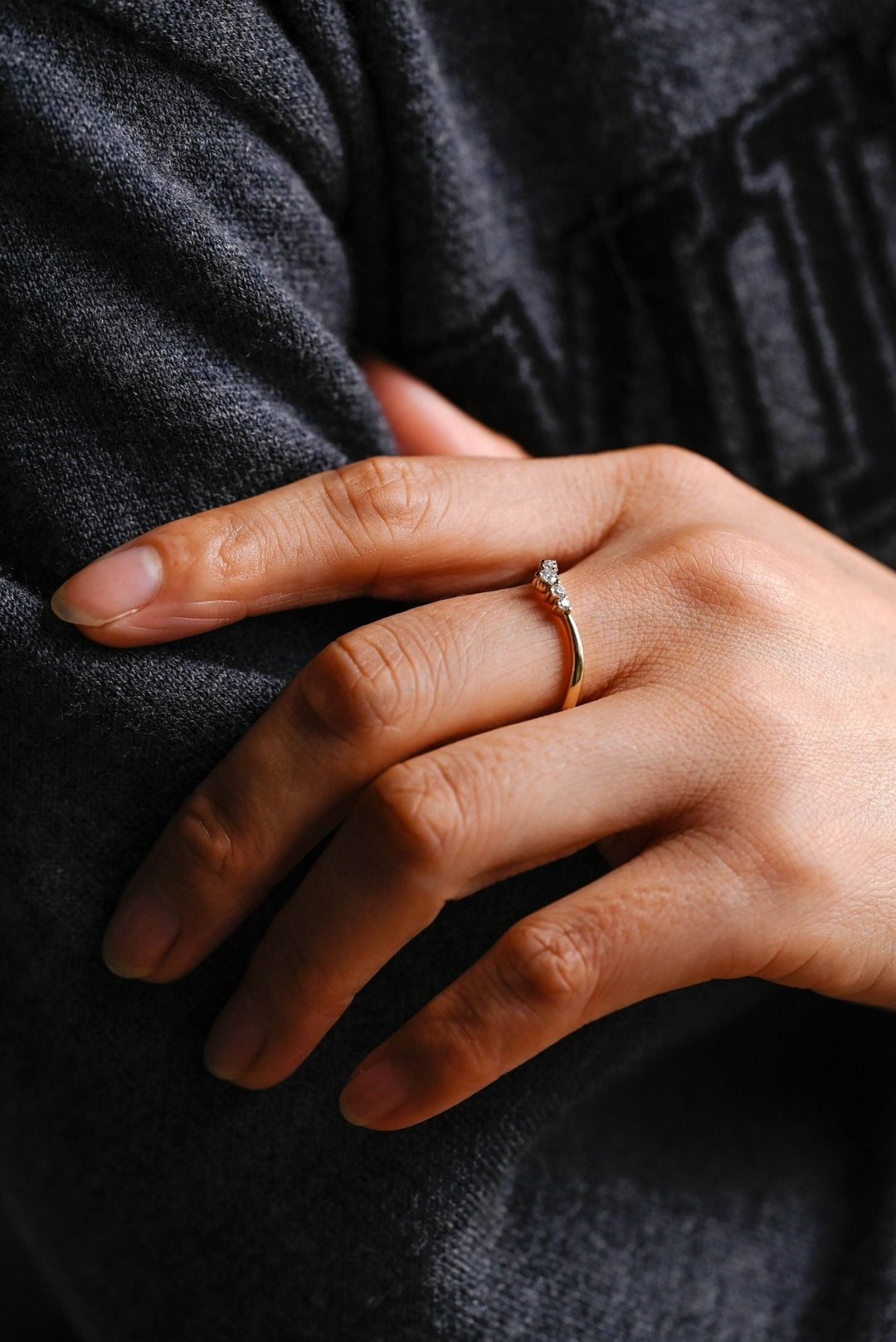 Round diamond band stacked with engagement ring
