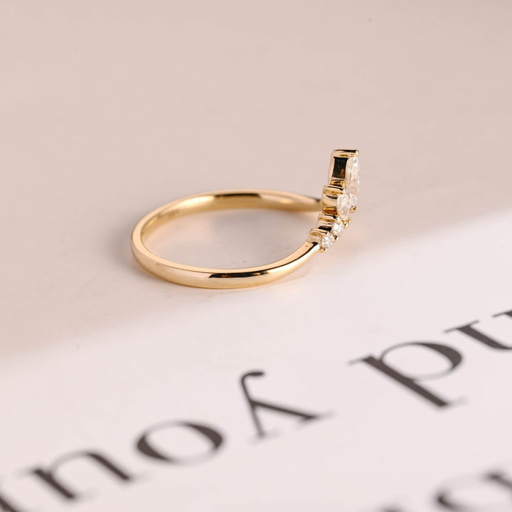 Ethically sourced marquise & round diamond eternity band