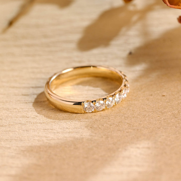 Side view of round diamond wedding band