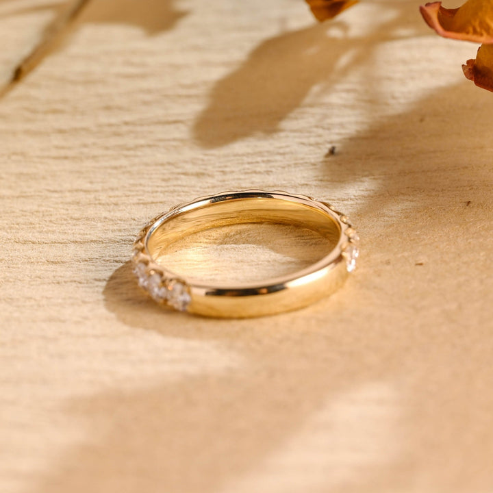 Round lab grown diamond band worn on hand