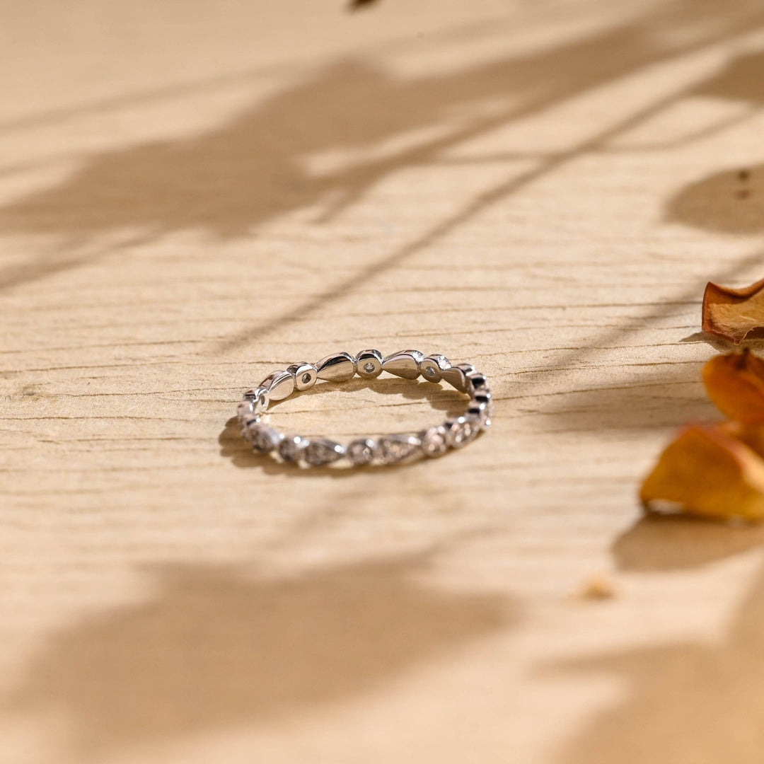 Round diamond wedding band in rose gold