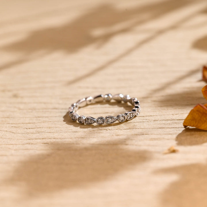 Side view of round diamond wedding band