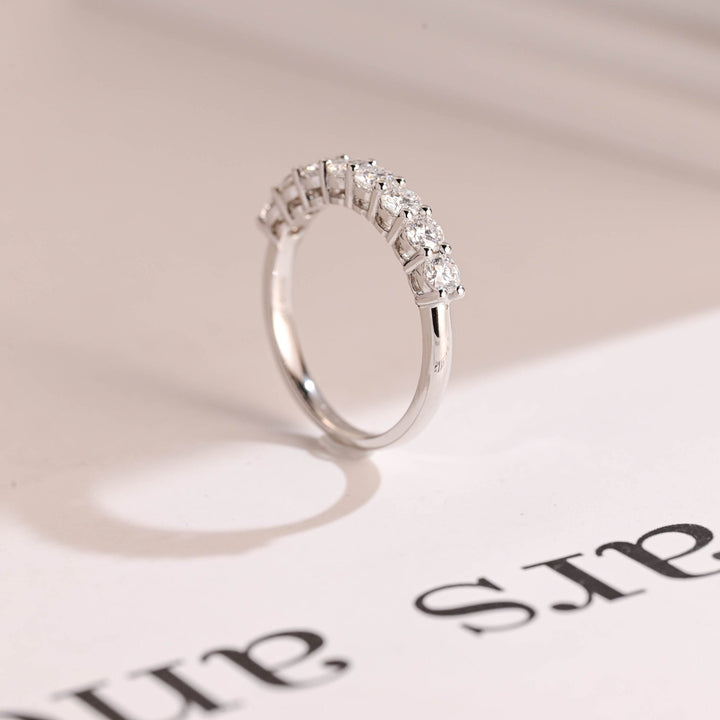 Round diamond band stacked with engagement ring