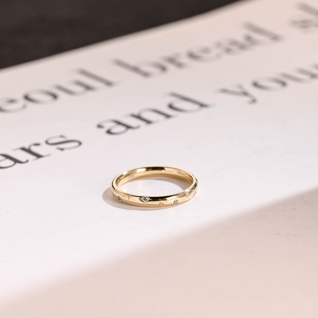 Round diamond wedding band in rose gold