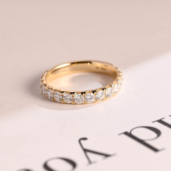 Round diamond wedding band in rose gold