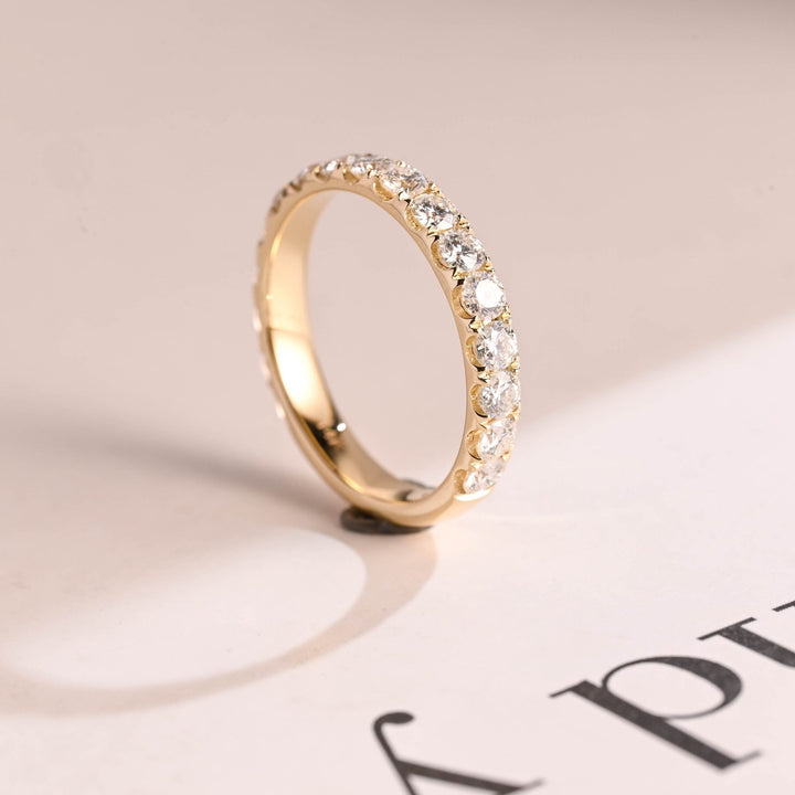 Side view of round diamond wedding band