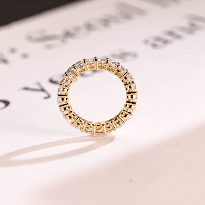 Side view of round diamond wedding band