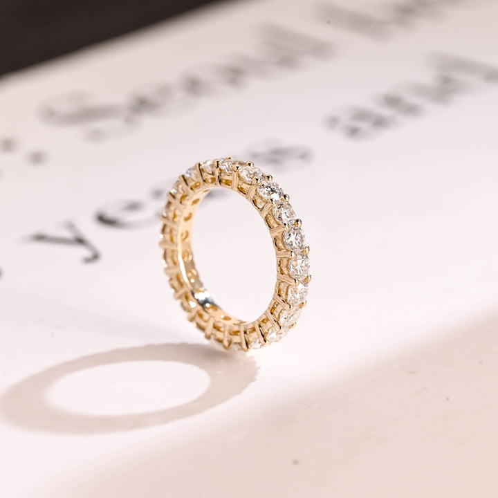 Round lab grown diamond band worn on hand