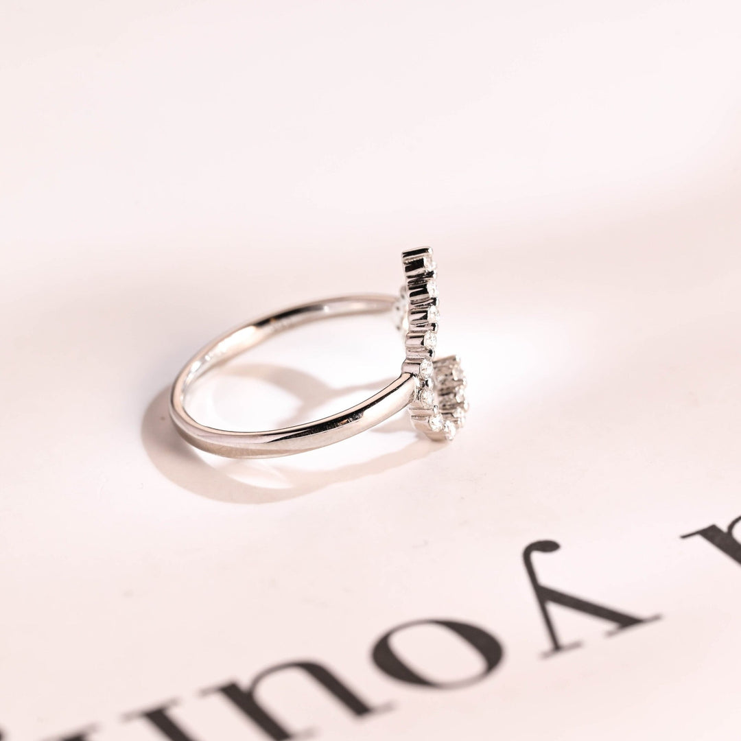 Round diamond band stacked with engagement ring
